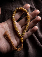 Hand Carved Citipati Skull Beaded Mala Bracelet With Tassel Natural Aged Yak Bone Vintage Tibetan Buddhist Prayer Beads Wrist Mala Authentic Handcrafted Protection Amulet Bracelet
