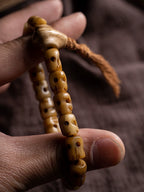 Hand Carved Citipati Lord of the Cemetery Single Strand Mala Bracelet Natural Aged Wild Yak Bone Skull Prayer Bead Bracelet Handcrafted Vintage Tibetan Style Yak Bone Wrist Bracelet